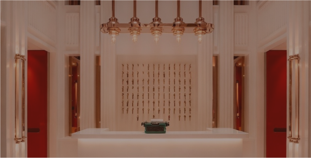 Check-in desk with typewriter and keys in the background